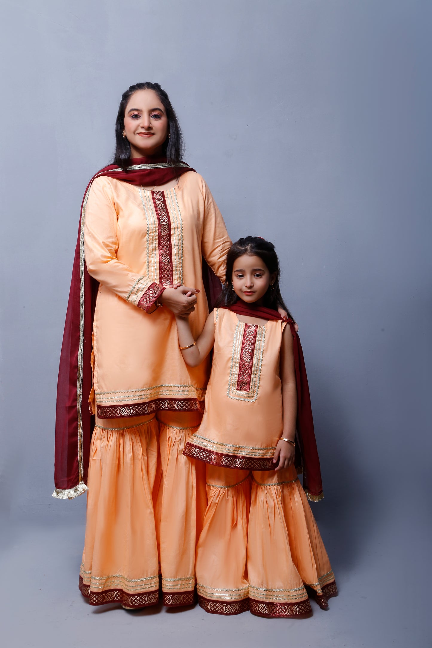 3 piece Elegant Peach Cotton Gharara Suit with Maroon & Golden Laces with Maroon Chiffon Dupatta.(Stitch)