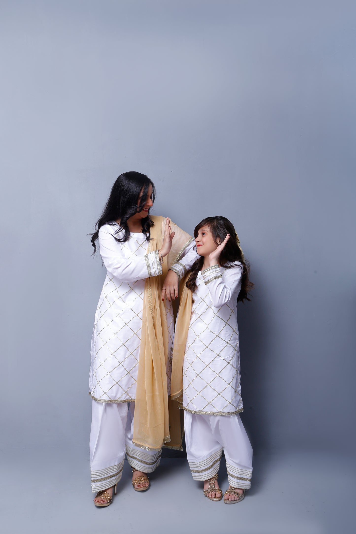 3 piece Elegant White Cotton Plazo Shalwar Kameez Suit with Golden Laces & Golden Chiffon Dupatta.(Stitch)