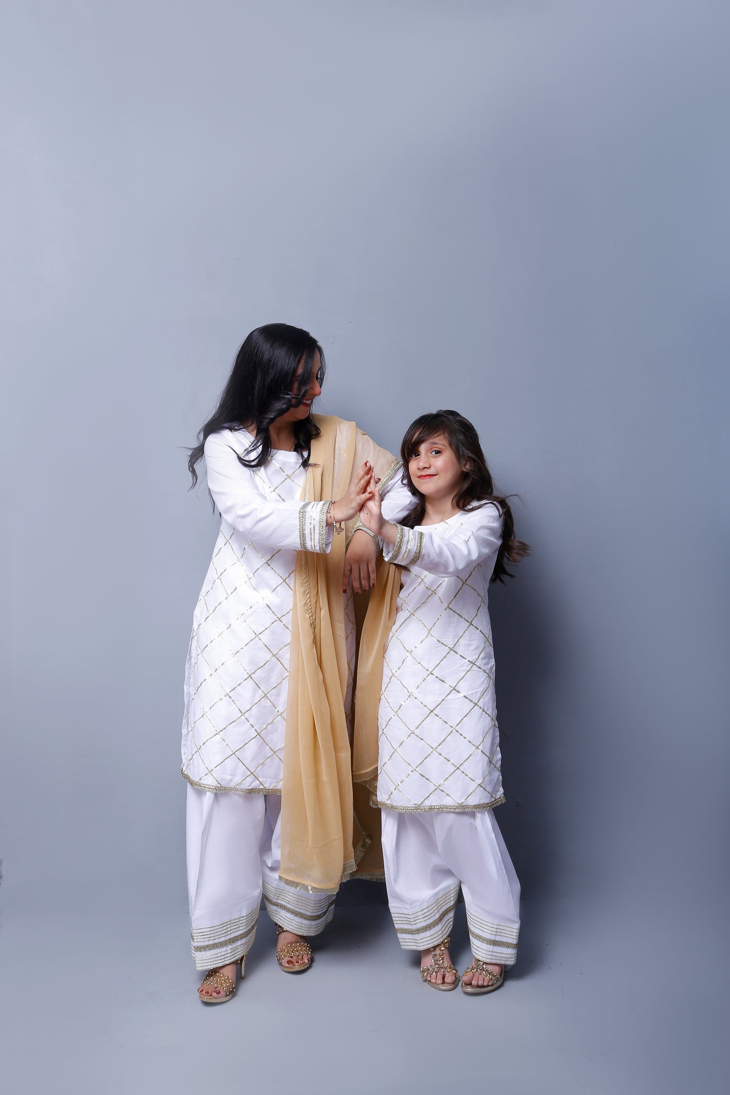 3 piece Elegant White Cotton Plazo Shalwar Kameez Suit with Golden Laces & Golden Chiffon Dupatta.(Stitch)