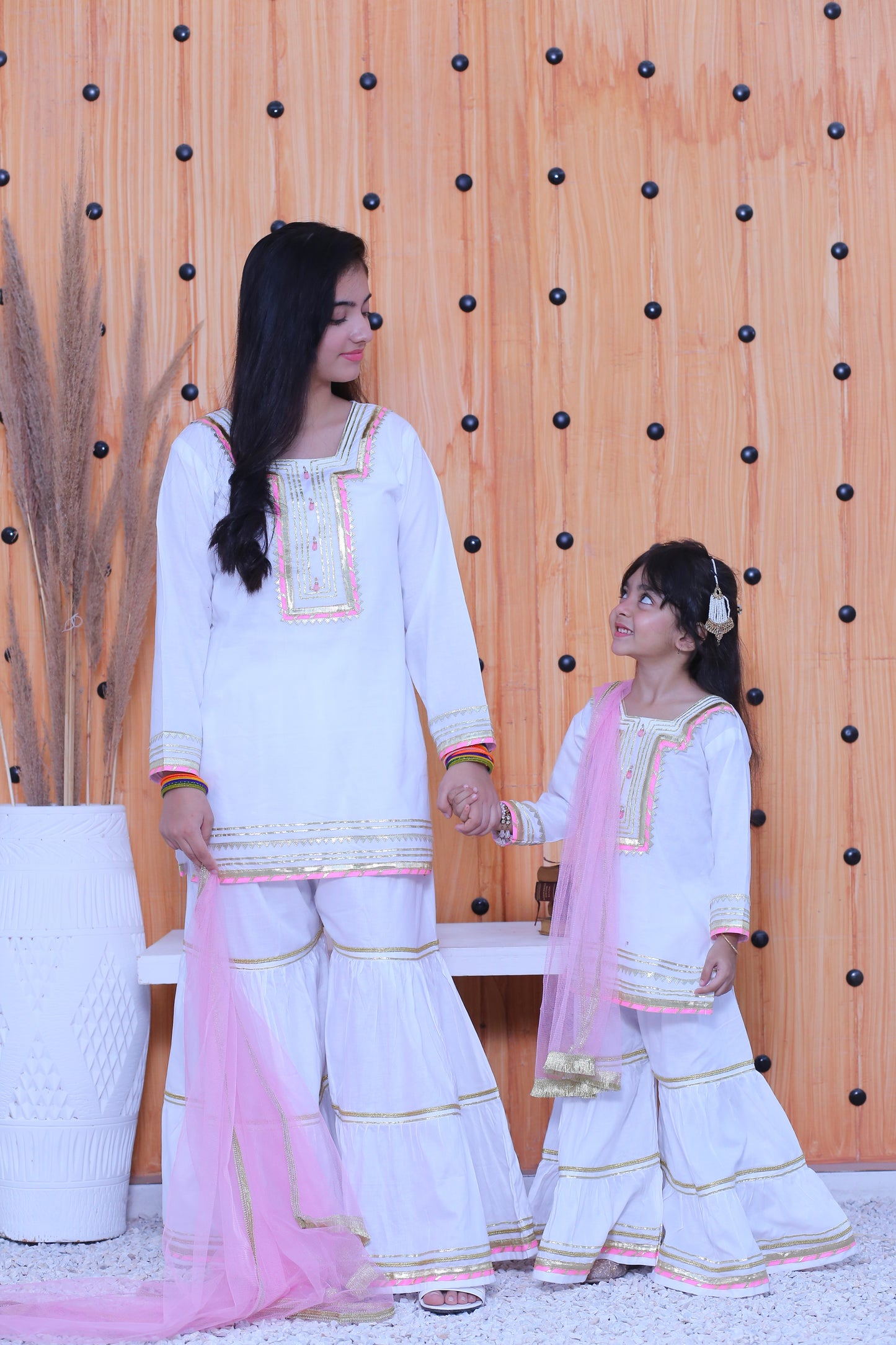 3 piece White Cotton Gharara Suit wiith Baby Pink net Dupatta & Baby Pink & Golden Laces.(Stitch)