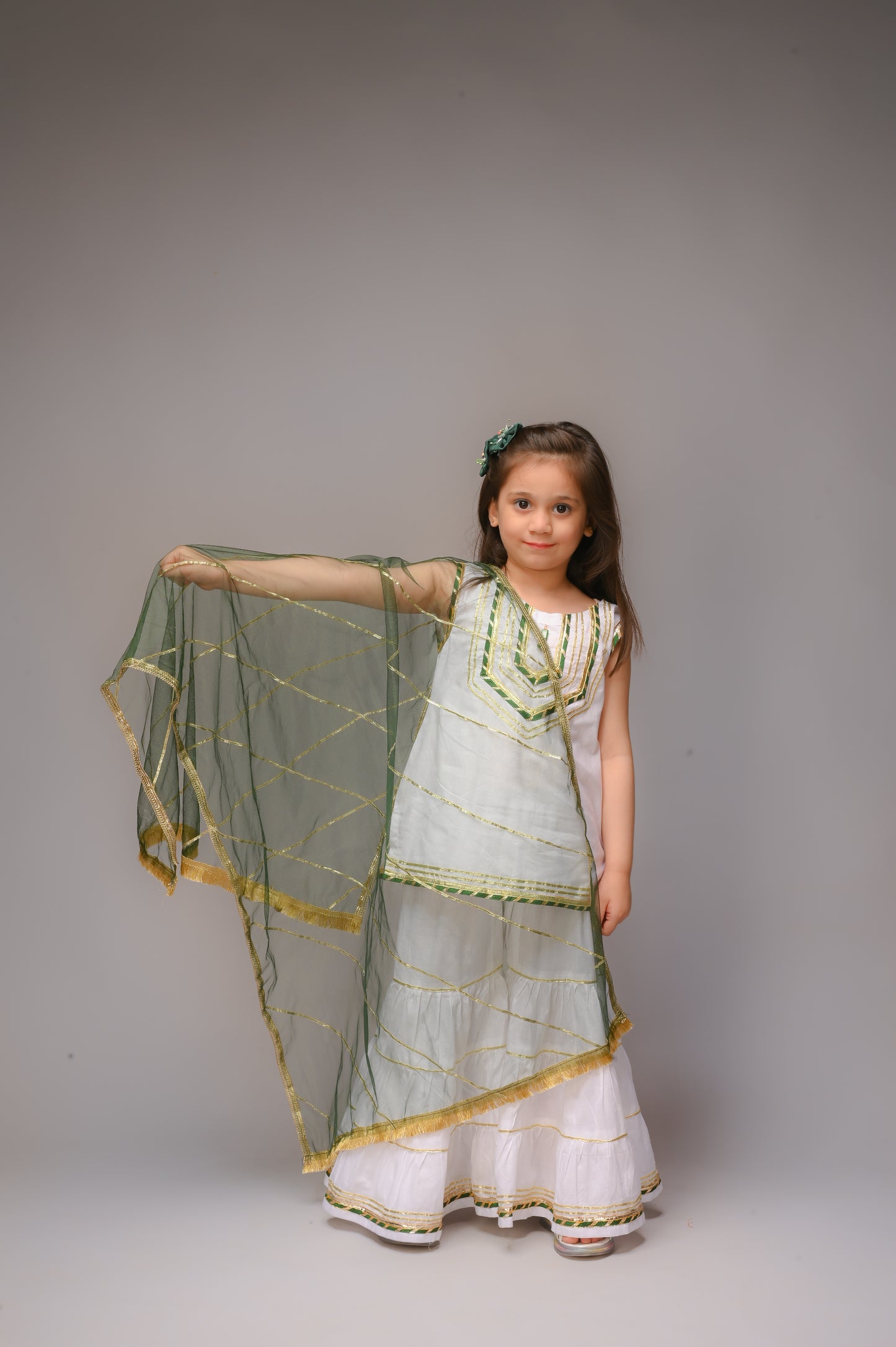3 piece White Cotton Sleeveless Gharara Suit with Bottle Green net Dupatta & Bottle Green & Golden Laces.(Stitch).