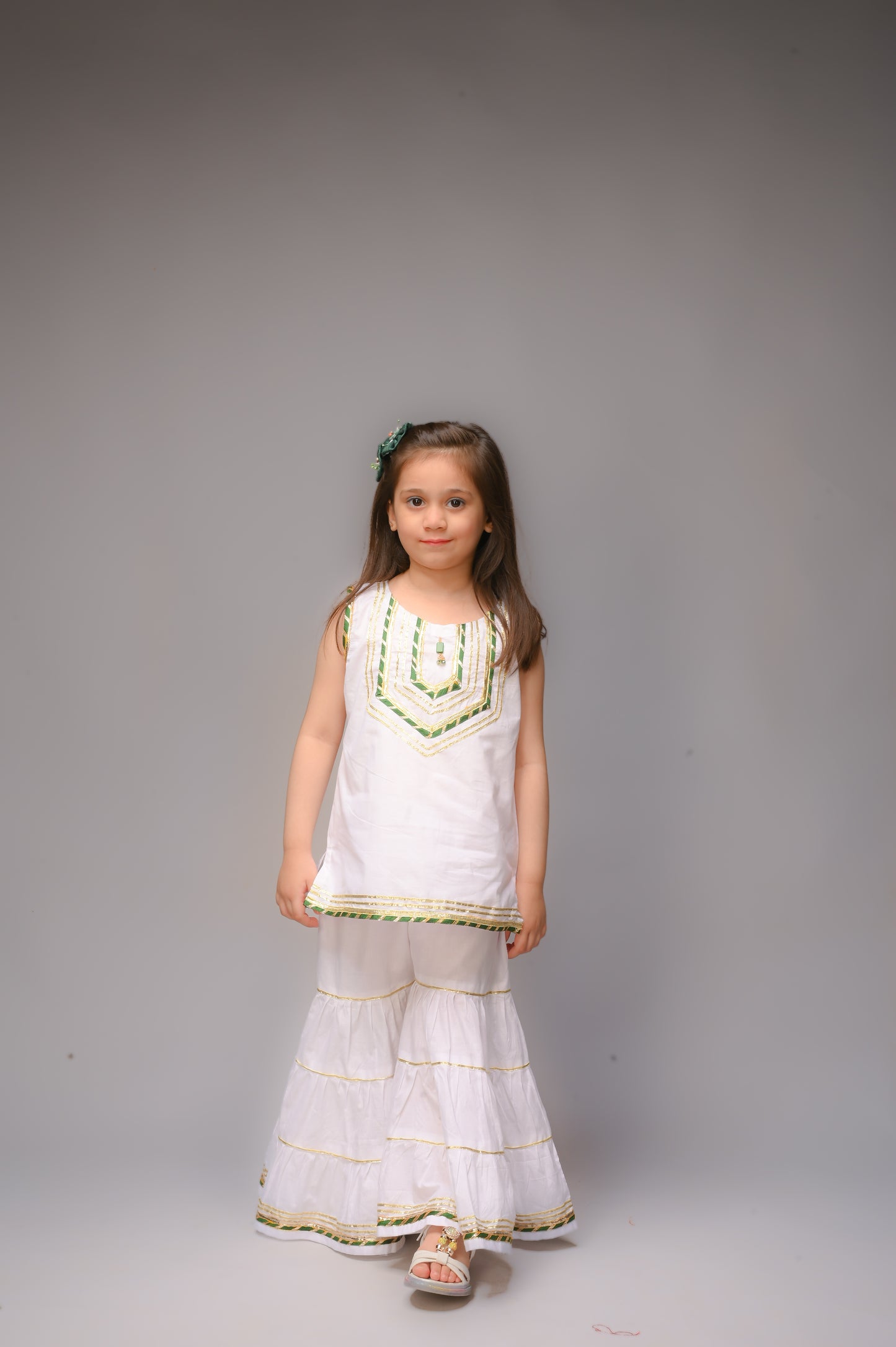 3 piece White Cotton Sleeveless Gharara Suit with Bottle Green net Dupatta & Bottle Green & Golden Laces.(Stitch).