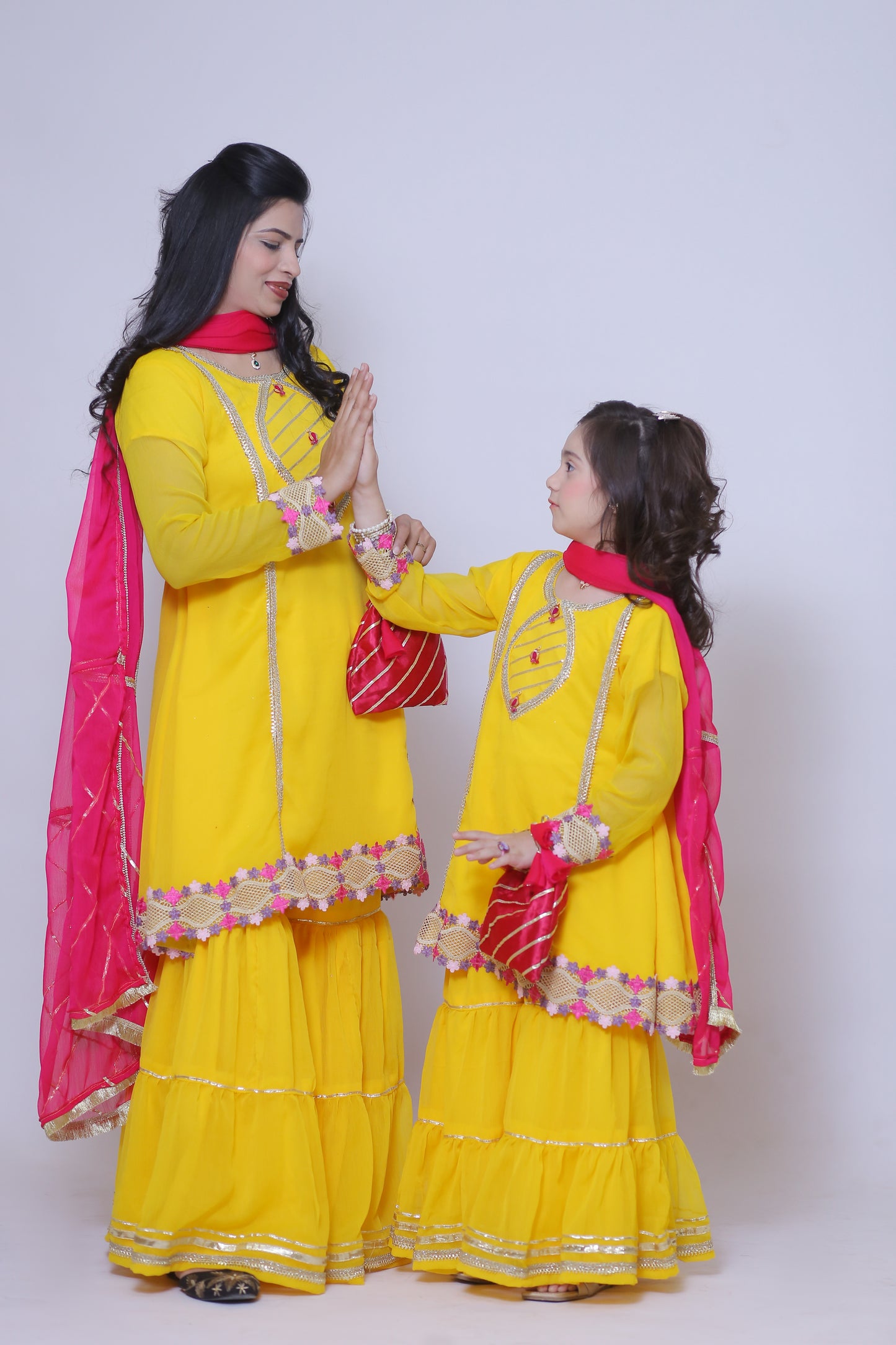 3 piece Beautiful Stunning Yellow Chiffon Gharara Suit with Shocking Pink Chiffon Dupatta & multicolor Laces.(Stitch)