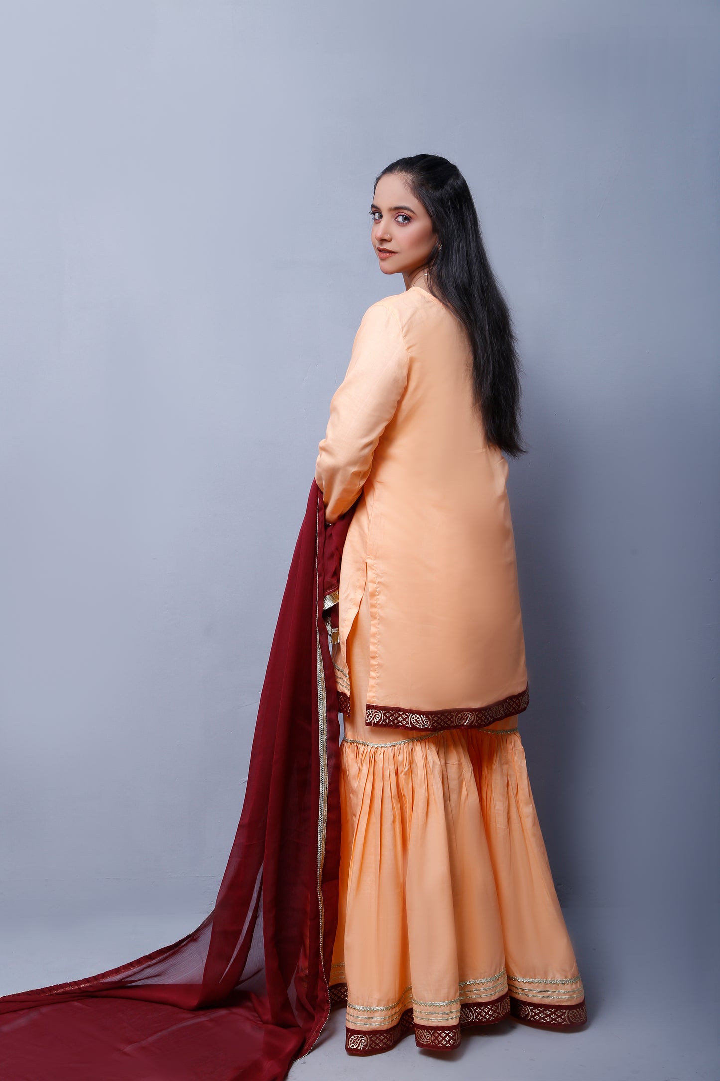 3 piece Elegant Peach Cotton Gharara Suit with Maroon & Golden Laces with Maroon Chiffon Dupatta.(Stitch)