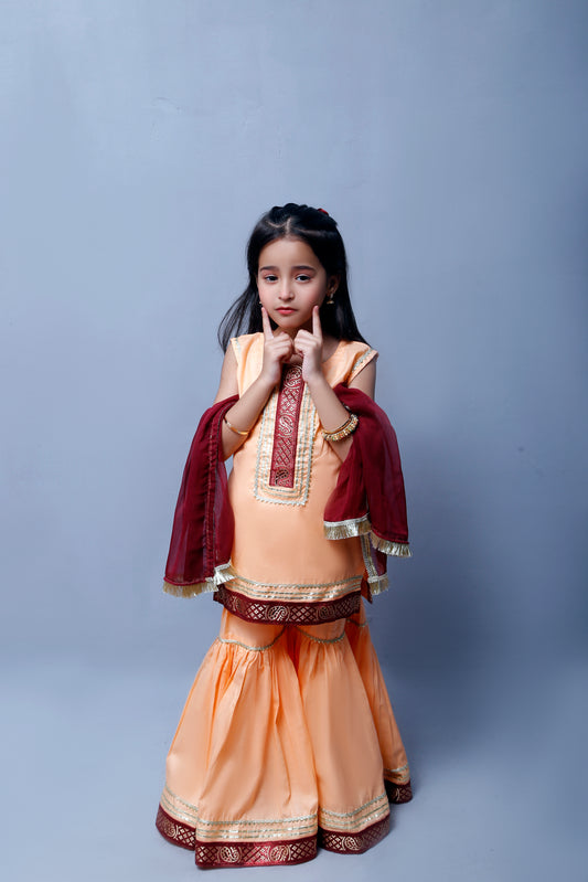 3 piece Elegant Peach Cotton Sleeveless Gharara Suit with Maroon & Golden Laces with Maroon Chiffon Dupatta.(Stitch)