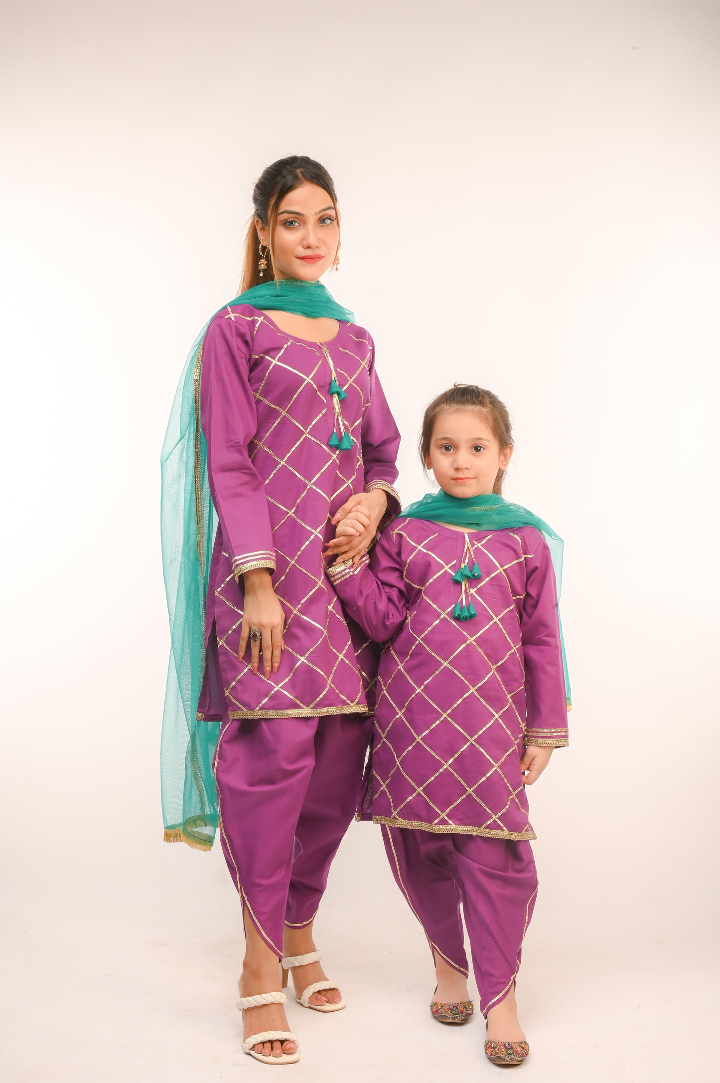 3 piece Purple Cotton Tulip Suit with Sea Green net Dupatta & Golden Laces.(Stitch).